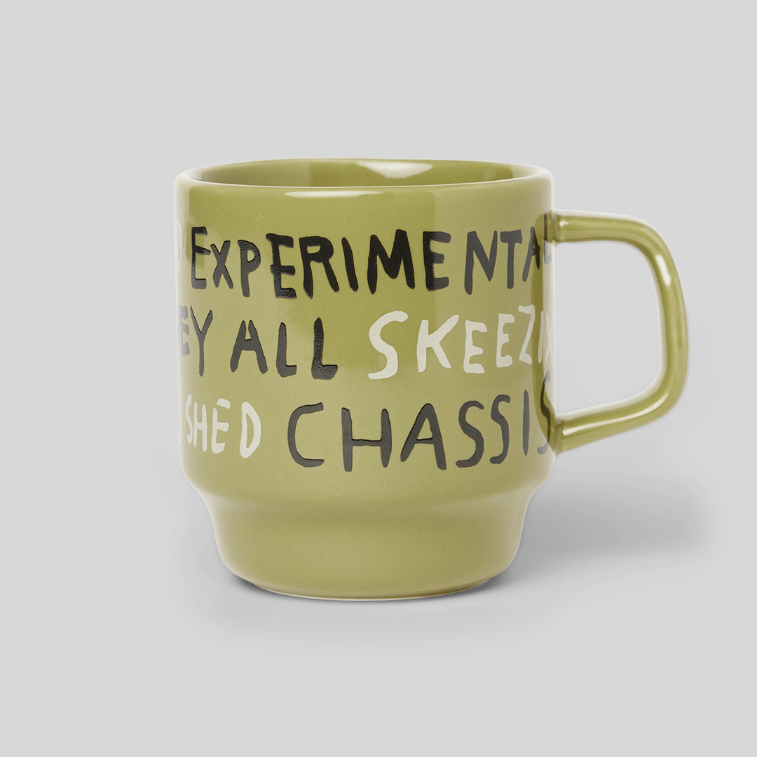 Basquiat Drawings Mug, Olive: Bring art to the every day with a mug that features several of the phrases etched on Basquiat’s Ferris wheel.
© Estate of Jean-Michel Basquiat. Licensed by Artestar, New York.